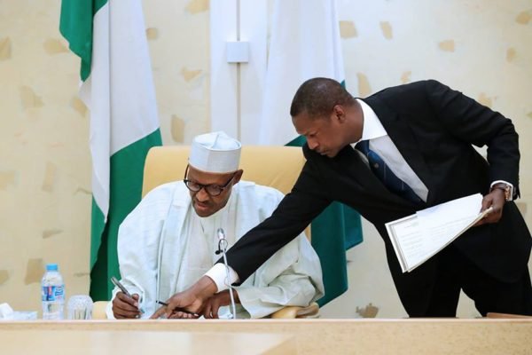 President Muhammadu Buhari signing the document today, 24, 08 2017